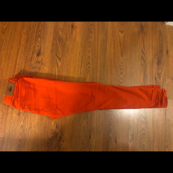 Lacoste orange colour jeans - Picture 2 of 2